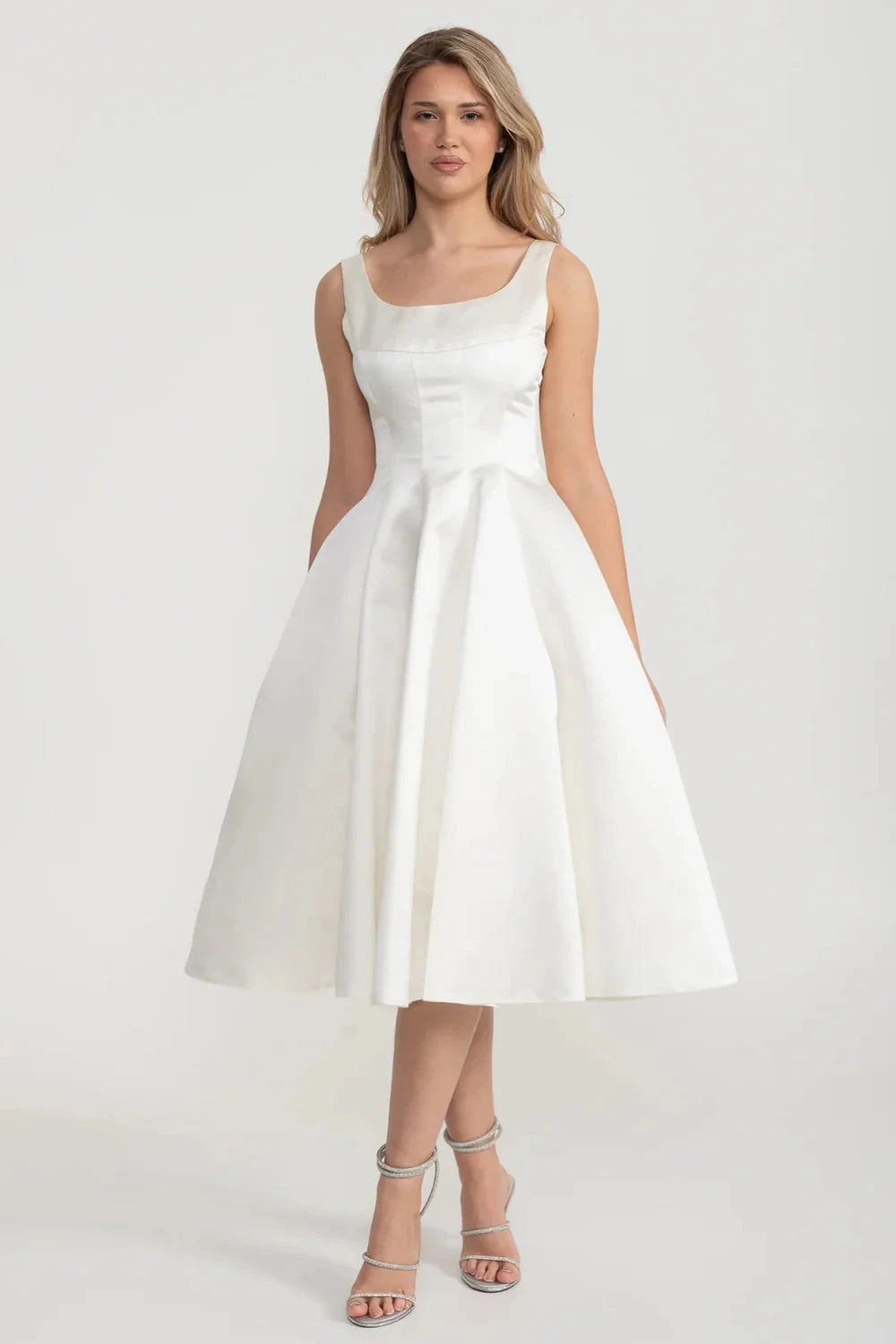 Elegant A-Line Sleeveless Dress With Tailored Bodice And Graceful Flared Skirt - White