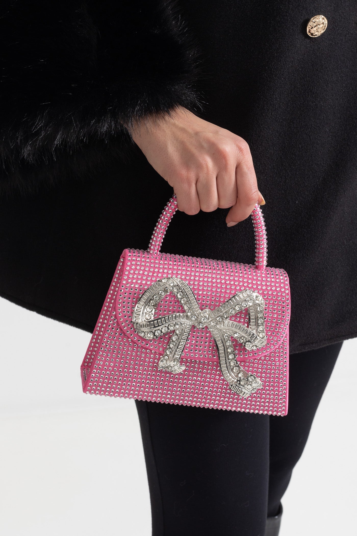 Funkelnde Strass-Clutch mit dekorativer metallischer Schleife – Pink