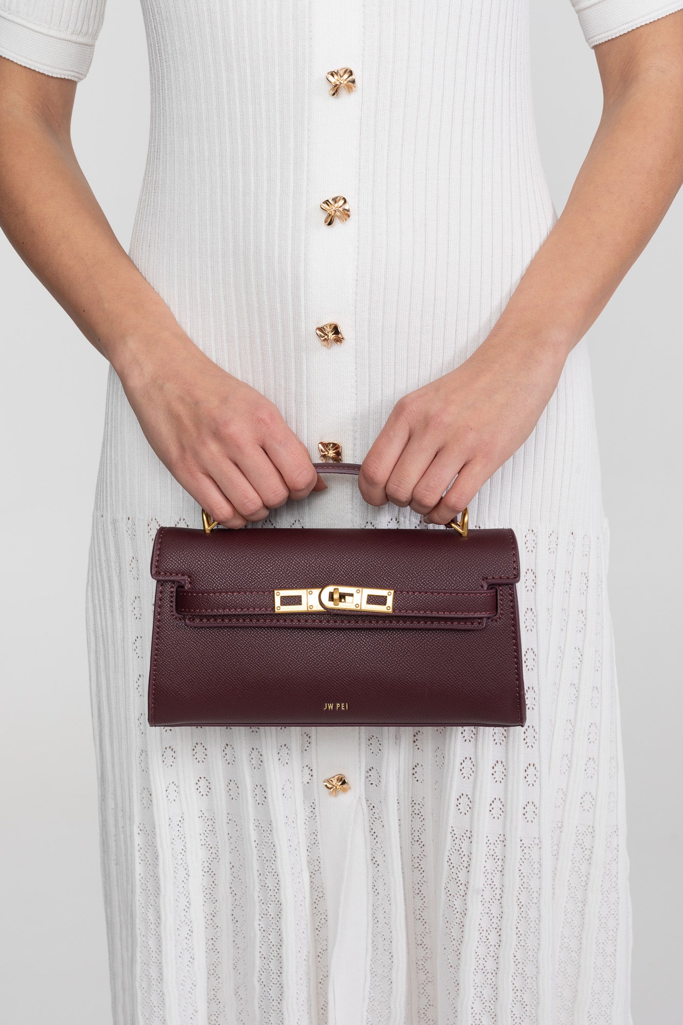 Strukturierte Mini-Tasche im Kelly-Stil mit goldfarbenen Beschlägen – Burgunderrot