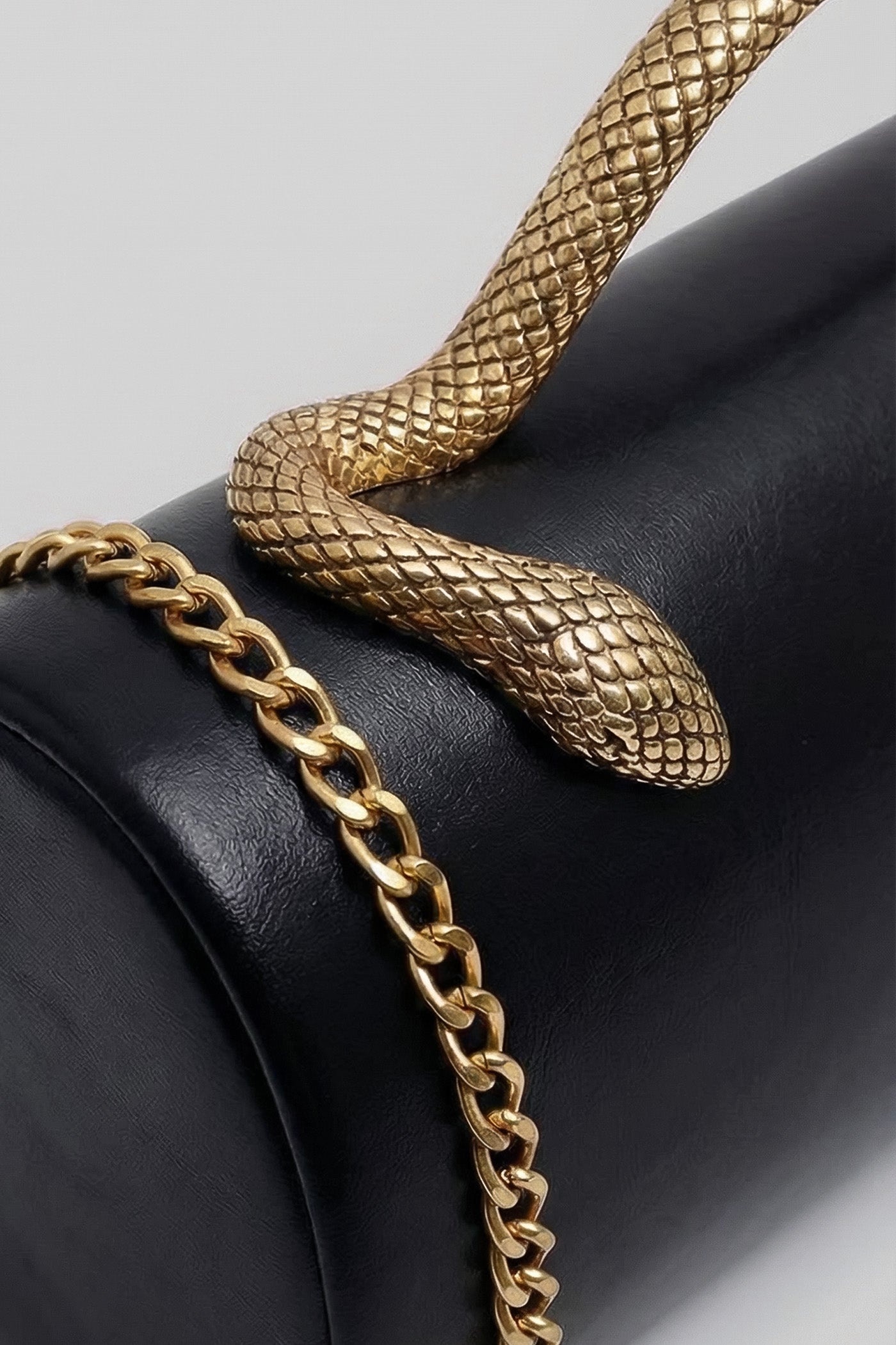 Structured Clutch Bag with Snake Handle And Gold Chain – Black