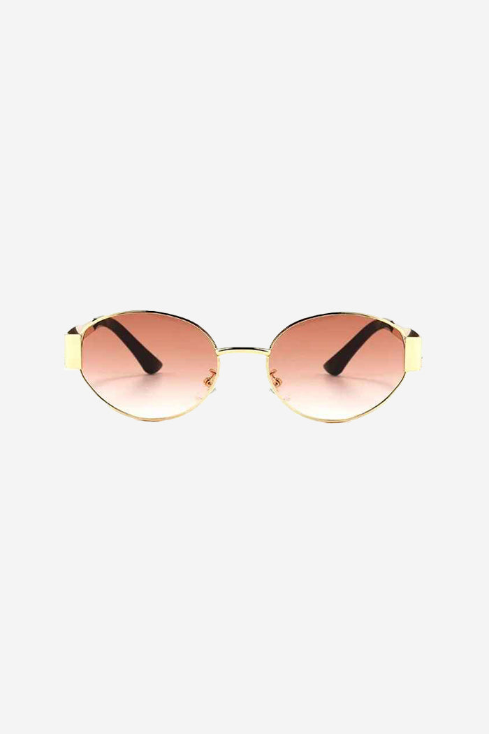 Sonnenbrille mit ovalem Rahmen und gravierten, breiten goldenen Bügeln – Pink