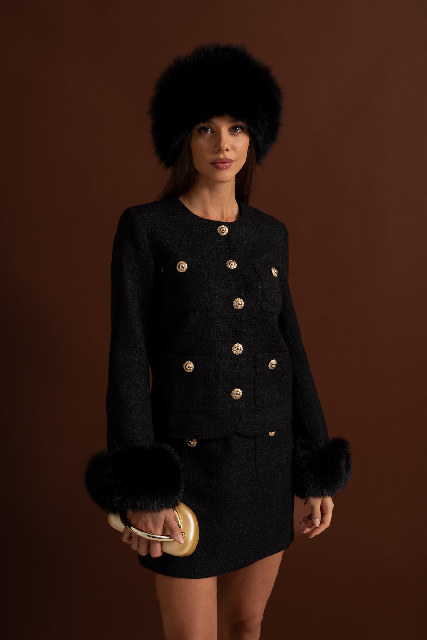 Tweed-Blazer mit Kunstpelzmanschetten und goldenen Knöpfen – Schwarz