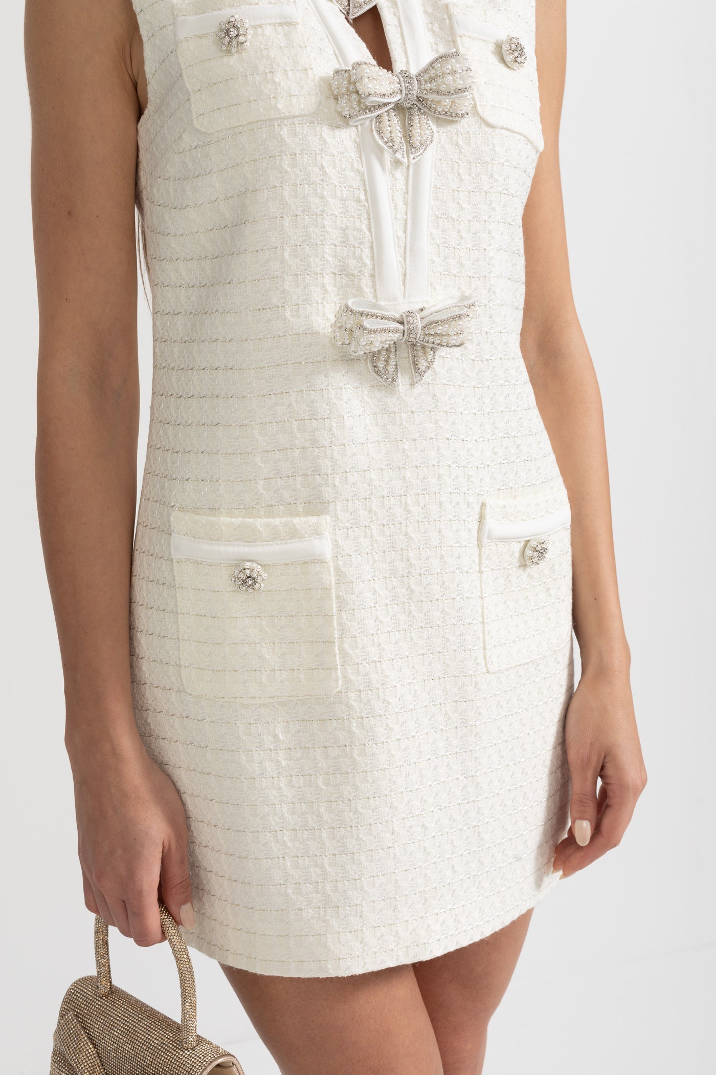 Textured Sleeveless Dress With Metal Embellished Bows - White