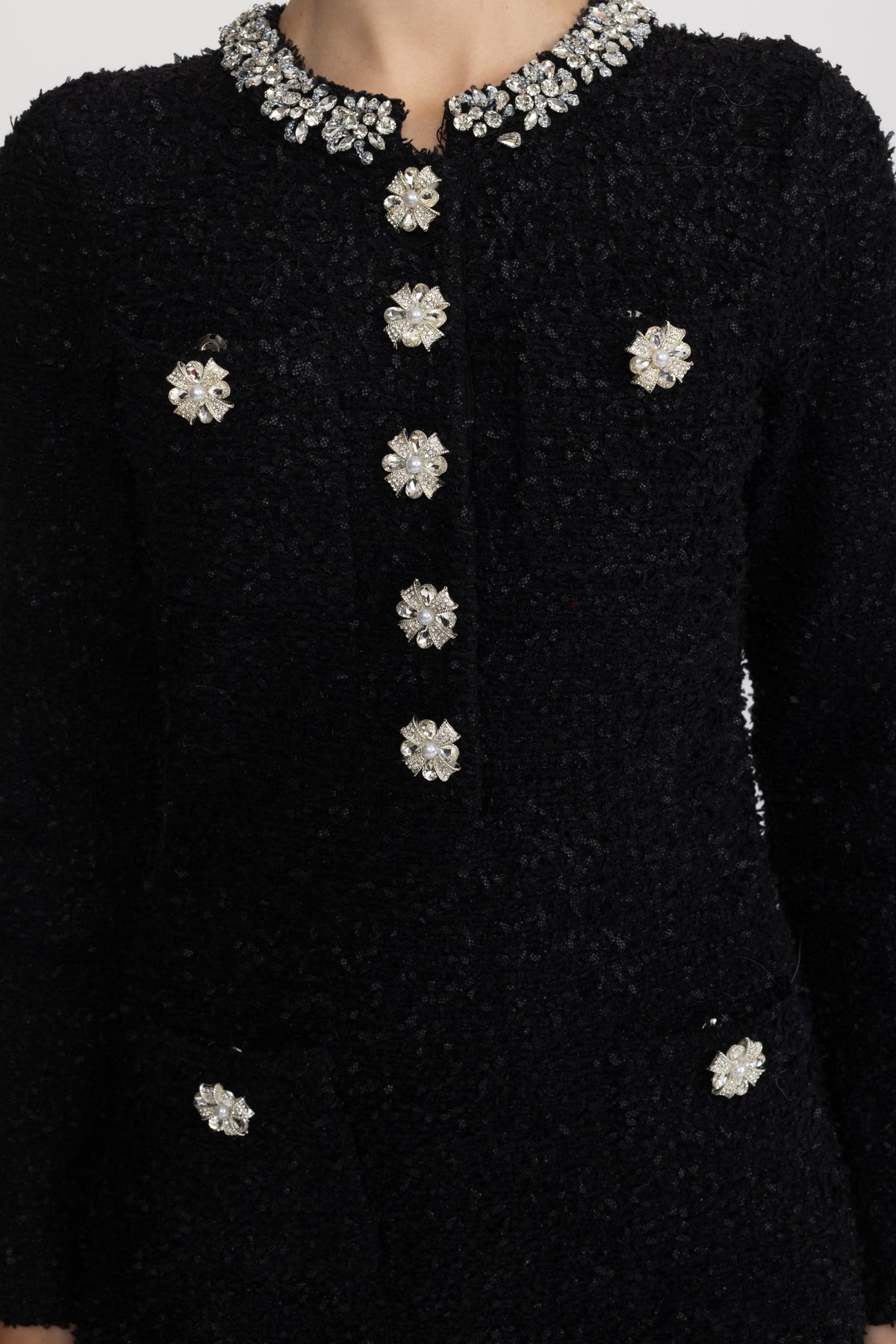 Mini-Kleid aus Bouclé-Strick mit Kristallbesatz - Schwarz 