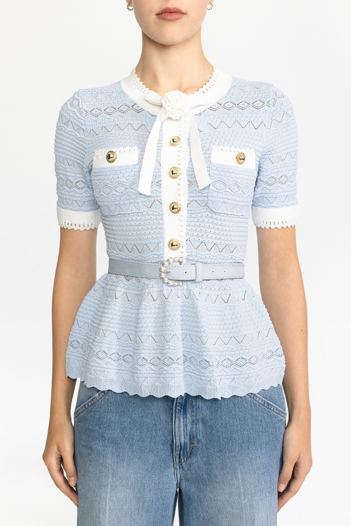 Pointelle-Stricktop mit Schleife und Schößchen - Hellblau 