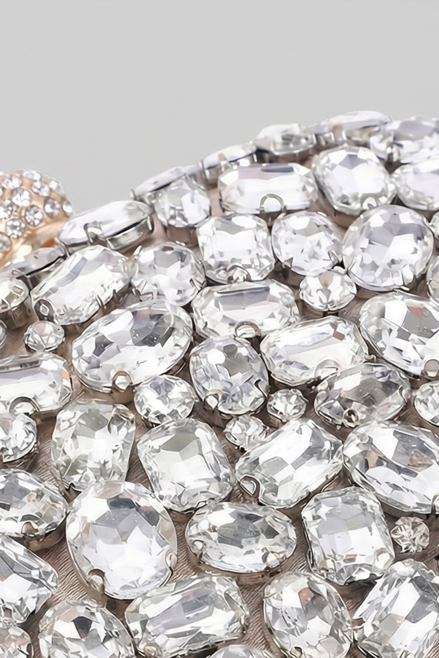 Crystal-Embellished Oval Clutch with All-Over Stone Finish – Gold